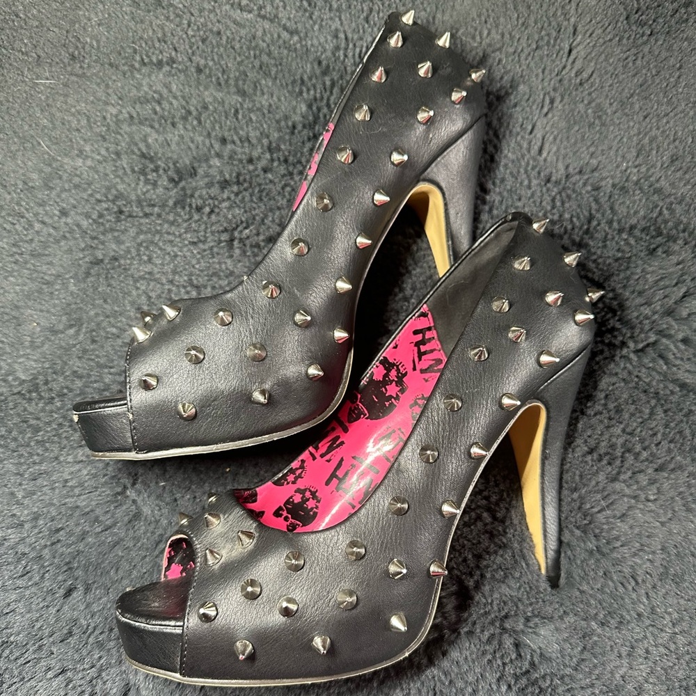 Beautiful black studded 4.5 inch heels. Brand is Abbey Dawn, size US 9.